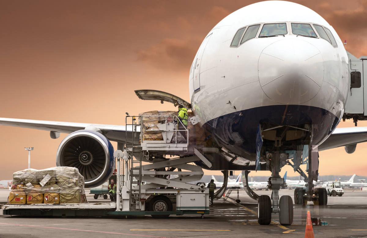 Cargo loading operation beside an aircraft